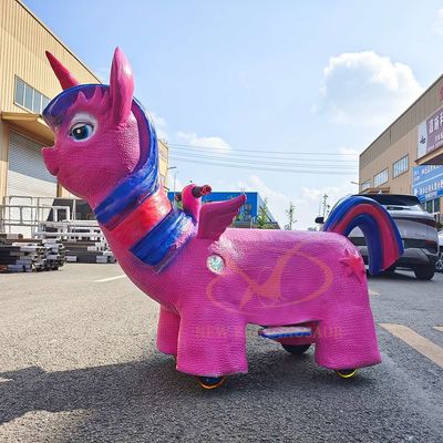 Paseo de unicornio animal de Jurassic World Park con monedas