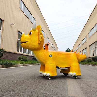 Animatronic Dinosaur Scooter Listrik, Yellow Ride On Electric Dinosaur Untuk Taman Hiburan
